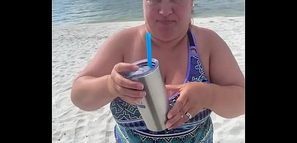  Slutty Bbw duca wife flashes her big tits on a public beach